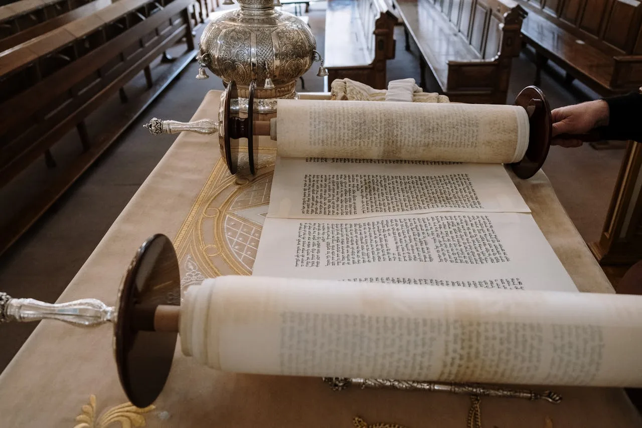 Who Wrote The Bible? Complete Guide To Its Divine Origins A Person Opening A Scroll. Who Wrote The Bible?